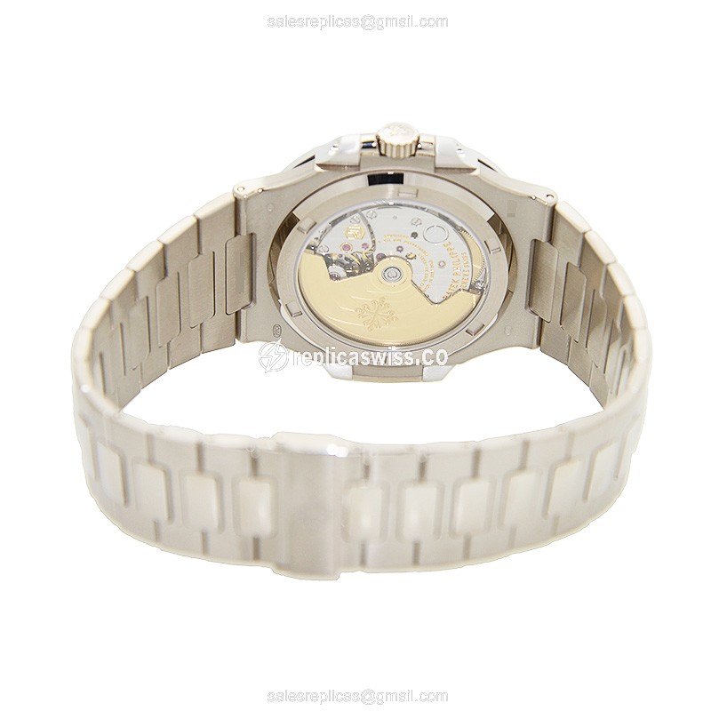 Patek Philippe 5713/1G-010 NAUTILUS - Auto - 18kt White Gold - Diamond Blue Dial - Silver Gold Clasp - View 4