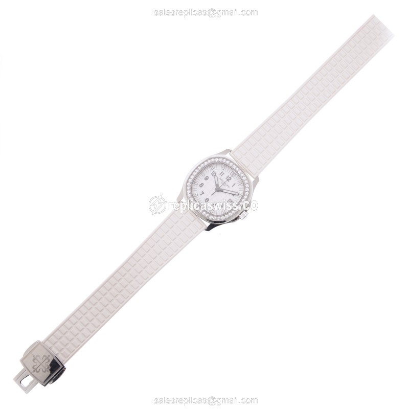 Patek Philippe AQUANAUT Quartz - Diamond Case - White Dial - Rubber Strap - View 2
