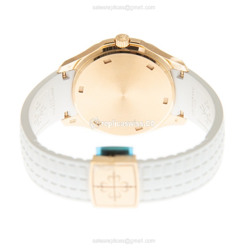 Patek Philippe AQUANAUT Quartz 18kt Rose Gold - Diamond Bezel - White Dial - Rubber Strap - View 4