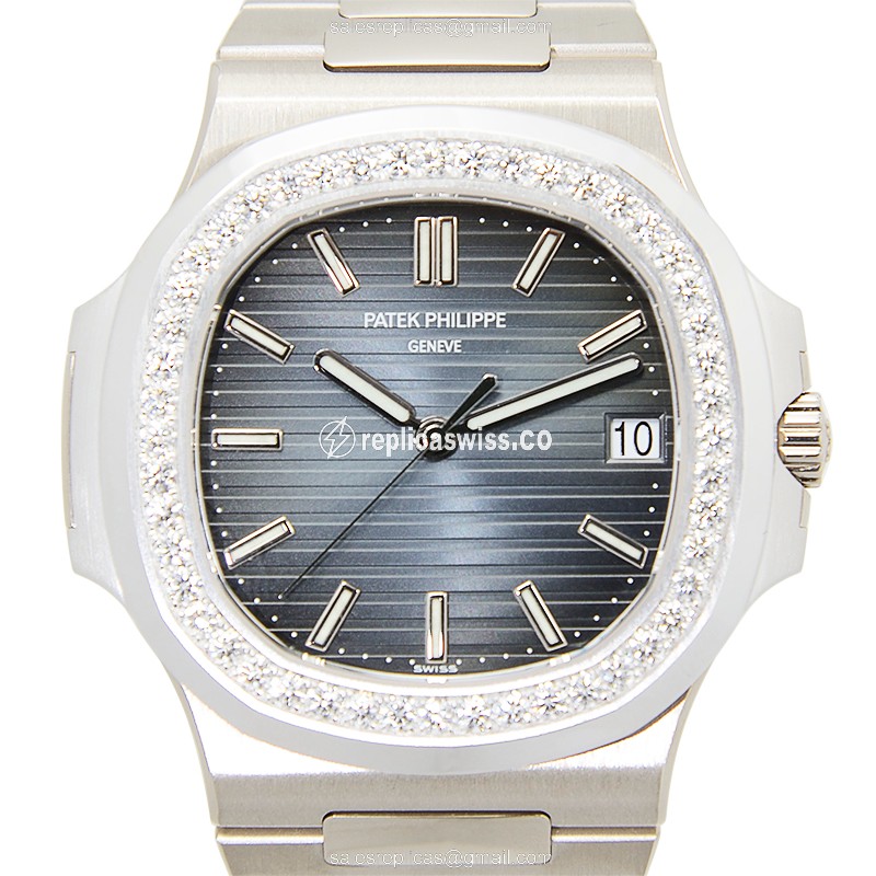 Patek Philippe 5713/1G-010 NAUTILUS - Auto - 18kt White Gold - Diamond Blue Dial - Silver Gold Clasp